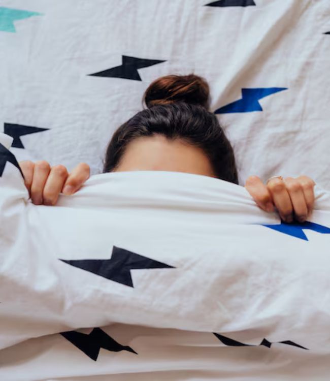 _sleeping with face covered