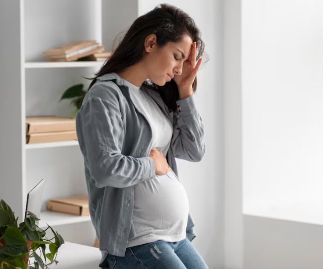 pregnancy fever and pain
