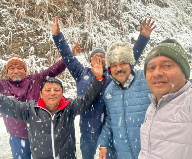 Tourist Enjoying Snowfall in chakrata