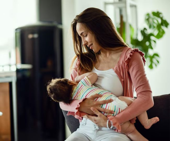 Mother breastfeeding milk
