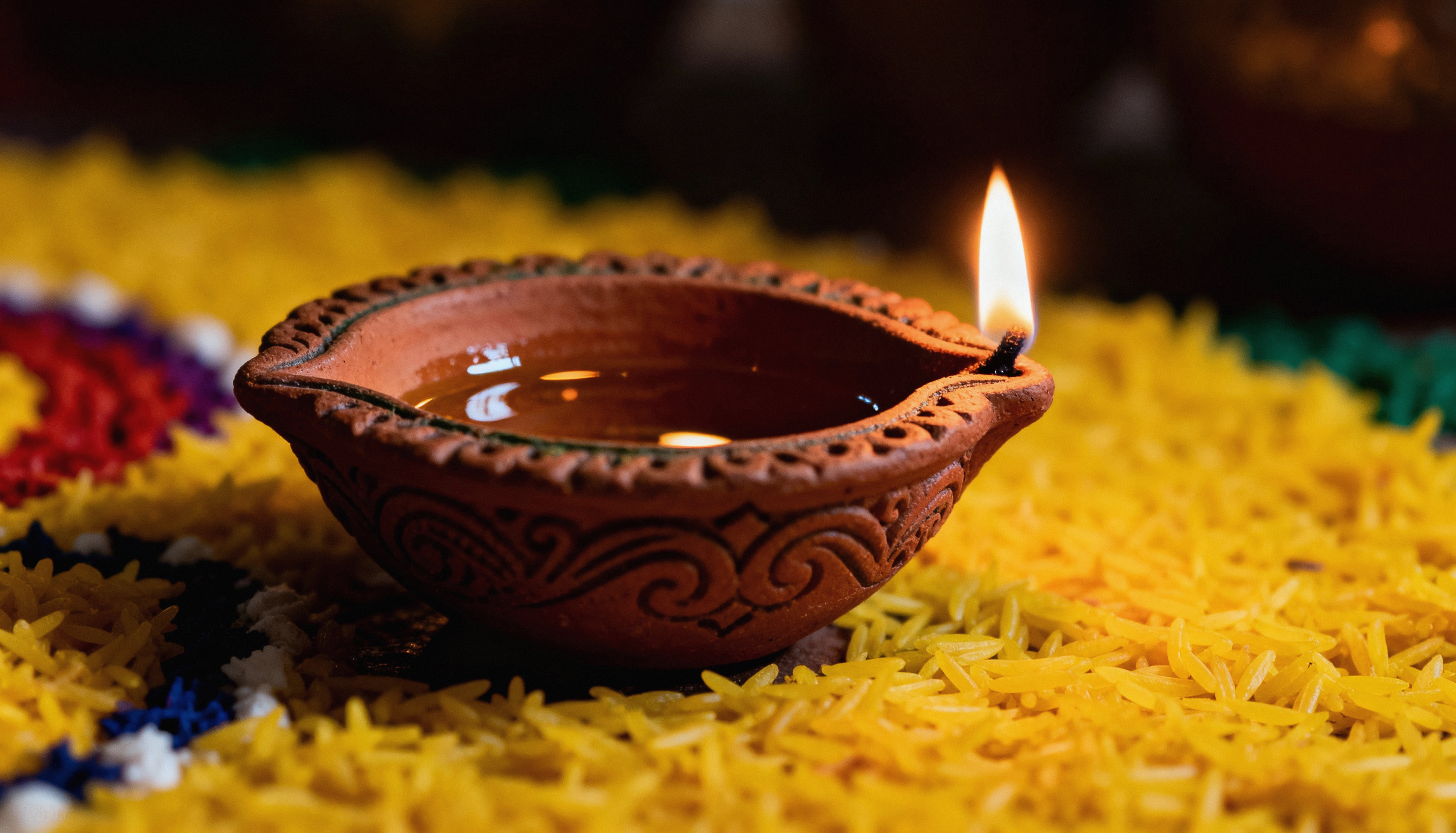 diya-lamp-yellow-rice-diwali-celebration